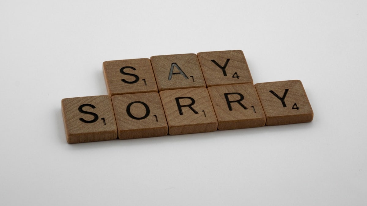 scrabble, scrabble pieces, lettering, letters, wood, scrabble tiles, white background, words, type, typography, design, layout, i am sorry, sorry, apologise, say sorry, regret, make up, break up, mistake, hardest word,